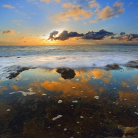 Golden Clouds Over the Ocean