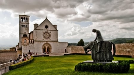 staue of francis of assisi in front of a church - clouds, grass, church, statue, saint