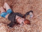 Cowgirl in the Hay