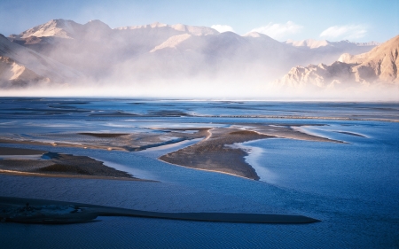 amazing landscape - sea, mountains, fog, sand bars