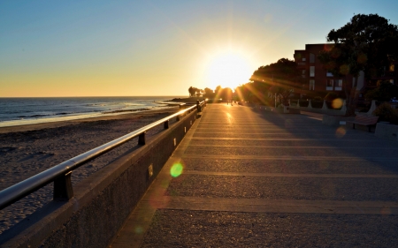 city beach walkway at sunset - rays, beach, walk, city, sunset, sea, rail