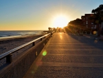 city beach walkway at sunset