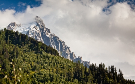 majestic mont blonc in the french alps - snoe, clouds, peak, forest, mountain