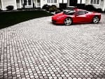 ferrari458 italia in a cobblestone driveway