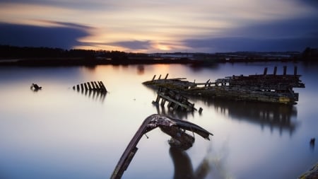 ship wrecks in a calm harbor - ships, harbor, wrecks, sunset