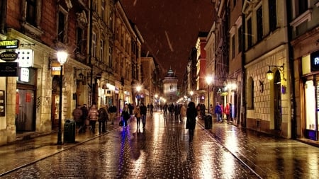 snowy night on a krakaw street - street, people, snow, cobblestones, city, night