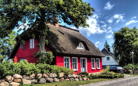 red house with thatched roof in germany - red, sky, thatch, stones, house, tree