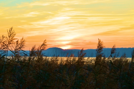 Autumn Sunset - sky, lake, reflection, hills, sun, grass