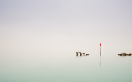 no horizon - sky, pier, broken, sign, water, rocks