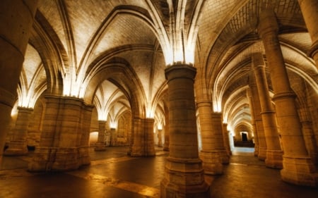 catacombs at a old french prison - arches, lights, catacombs, columns