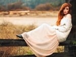 Cowgirl On A Fence . .