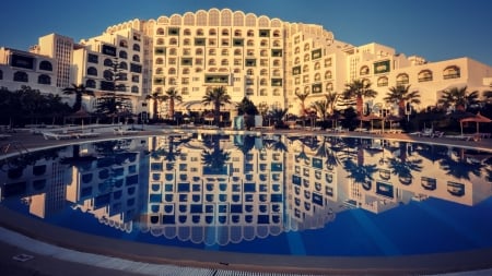 resort in tunisia with gorgeous pool - hotel, reort, reflection, pool