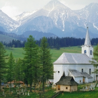 white church in an alpine valley