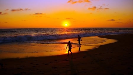 walking on a beach at sunset - silhouettes, people, beach, sunset, sea