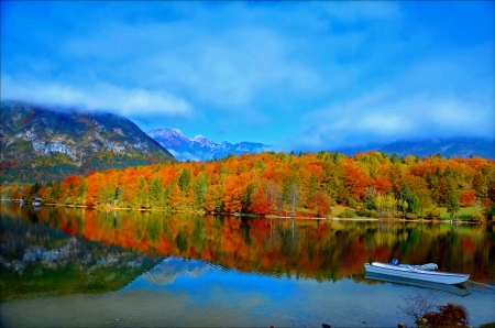 Fall reflections - sky, autumn, trees, colorful, foliage, fall, reflection, calmness, river, clouds, boat, lake, mountain, shore, serenity, forest, tranquil, beautiful, mirror, canoe