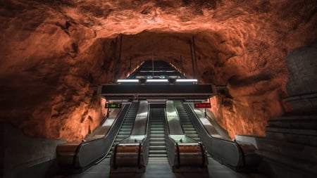 escolator in a real underground in stockholm - underground, rock, lights, up, escolators