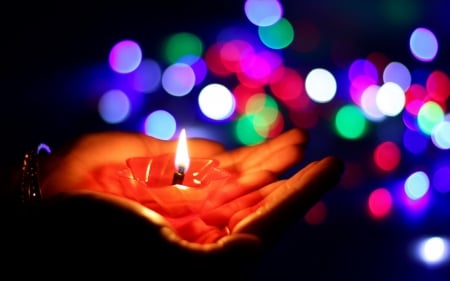 Praying - pink, dark, blue, candle, light, bokeh, hand, colorful, green