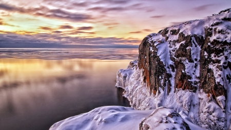 Rocky Sea Shore - reflection, cliff, clouds, water, sunset, sea