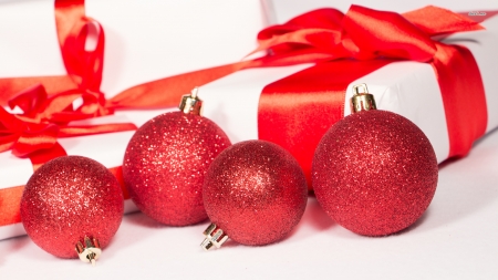 Four Red Baubles By The Presents