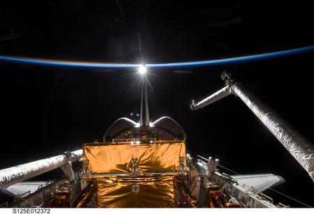 View of the Journey Home - shuttle, nasa, canada arm, sunrise, space