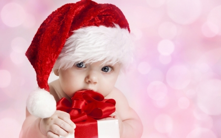 A gift to share - bokeh, craciun, gift, hat, child, copil, christmas, white, santa, baby, bow, pink, red, cute