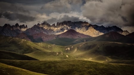 foothills in front of a mountain range - hills, mountains, clouds, grass