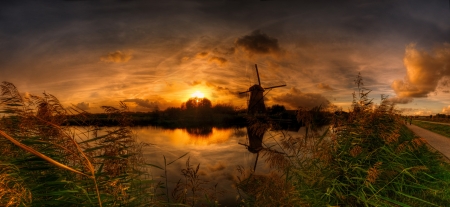 Mill at sunset - lake, sky, water, sunset, mill, wind, serenity, amazing, reflection, river, beautiful, grass