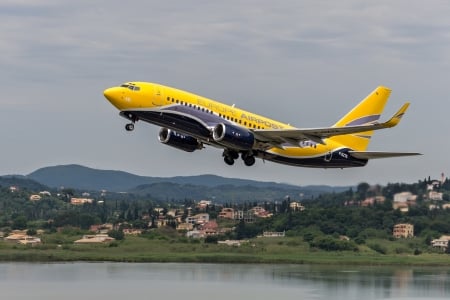 Yellow plane - boeing, yellow, landing, sea