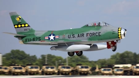 F-86 Sabre landing - also known as sabrejet, transonic jet fighter, first flight 1 oct 1947, landing gear down