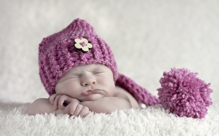 A grumpy baby - hat, mood, girl, pink, copil, sweet, grumpy, child, white, sleep, funny, cute, face