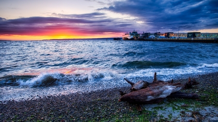 gravel beach by a ferry pier at sunset - pier, beach, sunset, gravel, sea, ferry