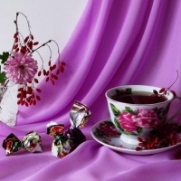 Cup of tea in purple background