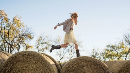 Cowgirl Having Fun - cowgirl, trees, boots, hay, bales