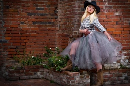 Cowgirl Wearing A Tutu Skirt - hat, cowgirl, bricks, skirt, boots, tutu, blonde, tutu skirt