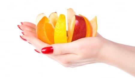 Colorful slices of fruits - apple, red, yellow, slice, fruit, orange, hand, woman, lemon