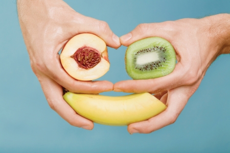 Funny face - yellow, blue, banana, appricot, hand, funny, green, fruit, face, kiwi