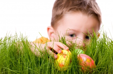 The hunter - easter, child, white, yellow, hand, boy, orange, green, card, egg, grass, hunter