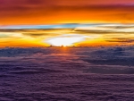 superb sunset above a sea of clouds