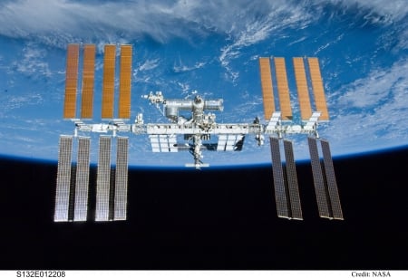 The International Space Station over Earth - space, cool, fun, space station, earth