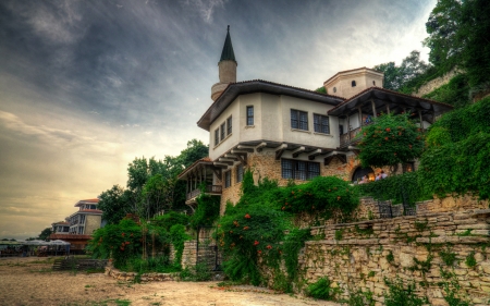 Balchik, Bulgaria - sky, cliff, wall, clouds, stones, house