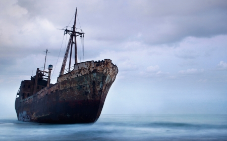 Shipwreck - ocean, ashore, washed up, water, shipwreck, sand, land, boat