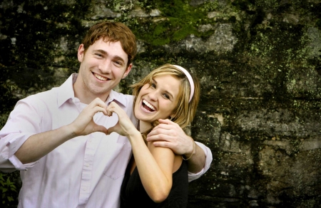 Romantic couple - laughing, hands, love, heart