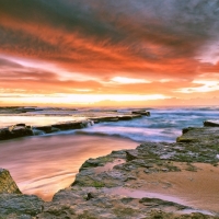 Red Clouds Upon the Rocky Ocean