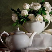 white roses and teapot