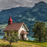 lovely church on a hill overlooking a river hdr