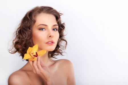 Beauty - woman, beauty, girl, orchid, model, white, face, yellow, hand, flower