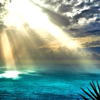 Sunbeams on blue Ocean