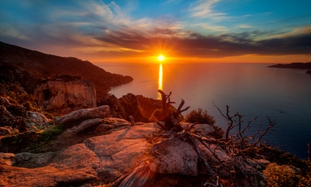 Fiery sunset - rays, sky, water, sunset, rocks, coast, glow, amazing, reflection, fiery, beautiful