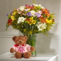 spring bouquet and teddy bear