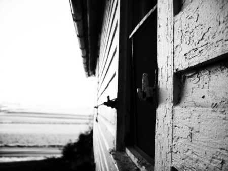 Blackened Window - white, stone, wood, rust, church, window, dirt, black and white